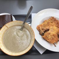 From left to right : coconut cake with chocolate glaze, eggplant cold soup, lasagna  at Happy Feel in Lyon