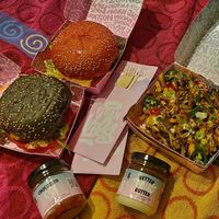 Cruelty free (black), daddy (pink), kapsalon fries. Didn't rate the blue sauce but the chicken pieces in the daddy burger were nice. #Veganuary at Vegan Junk Food Bar - 2D in Amsterdam