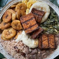 Plantains, mac n cheese, dumplings, jerk tofu, sautéed greens, nine bean stew, rice and peas at Ninth Square Market Caribbean Style in New Haven