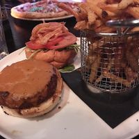 Beyond meat burger with vegan cheese and fries  at EVOO in the Courtyard in St Johns
