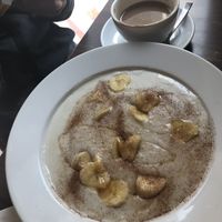 Porridge and cappuccino   at French Bakery in Kathmandu