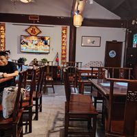 Upstairs seating at Qiānhé Qīngxīn 谦和清心素食 - 温江店 in Chengdu