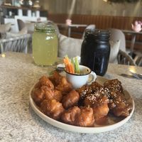 Cauliflower wings, mojito without alcohol and a detox with activated carbon.   at Capricho Sin Culpa in Queretaro