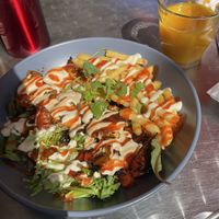 Shawarma bowl -tofu, grains, fries, leaves, garlic sauce etc   at Bailgate Deli in Lincoln