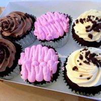 Chicken schnitzel and varietal of cupcakes :) at Las Vegan Cafe in Collingwood