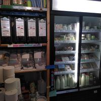 Cleaning supplies and cosmetics, fridge at Roots in Brussels