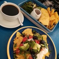 Breakfast burrito above. Regular nachos below at The Accidental Vegan Cafe in Honiton