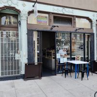 Two outside seating areas at Nourish Cafe in San Francisco