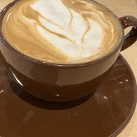 Latte with Three Trees barista almond + oat milkmilk  at Nourish Cafe in San Francisco