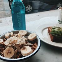 Acai Bowl with granola and banana, as well as avocado toast at Nourish Cafe in San Francisco