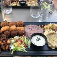 I can't remember exactly the name of the dish, but it's a mixture of several highlights from their menu (the big version). Comes with bread. at Tahina in Tours