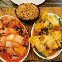 Veg, tofu and cashews in sweet & sour sauce (left) and szechuan sauce (right) with fried rice. at Fu's in Caernarfon
