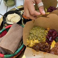 Mixed selection of curries lunch box  at Beza Ethiopian Food in South East London