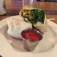 Breakfast burrito. Subbed tofu for eggs and tempeh for meat and held the cheese. Potatoes and spinach! at Cafe Berlin in Columbia