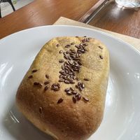 Enroladinho de salsicha - nicely baked pouch with hot dog inside.   at Padoca Vegan in Sao Paulo
