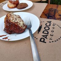 Chocolate cake, hazelnut cookie, "sonho" sweet cake at Padoca Vegan in Sao Paulo