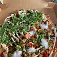 Half cheeky vegan, half tandoori tofu  at Riptide Pizza in Woolgoolga