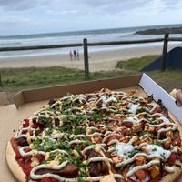 The Lookout points to the beach are beautiful places to eat the take-away pizza. There are lots of picnic areas. We had 1/2 Jackfruit-Barbecue and 1/2 Tandoori-Tofu.  at Riptide Pizza in Woolgoolga