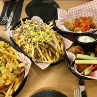 Vegan poutine, 4/20 fries, cauliflower wings and jackfruit nuggets at Down the Hatch in Liverpool