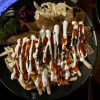 Kebabish seitan döner with chilli sauce and tzatziki   at Down the Hatch in Liverpool