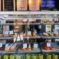 Interior display case with donut variety and merchandise. at Doe Donuts in Portland