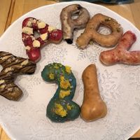  H - millionaire’s shortbread A - BBue raspberry poptart P - blueberry pancake old fashioned P - almond pistachio baklava Y - pink lemonade 2 - birthday cake 1 - vanilla bean  at Doe Donuts in Portland