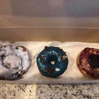 Blueberry lavender fritter, cookies & cream, and marionberry! at Doe Donuts in Portland