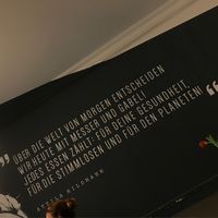 “Today we decide on the world of tomorrow with knife and fork! Every meal counts: for your health, for the voiceless and for the planet!” at Attila Hildmann Organic Snackbar I in Berlin