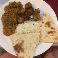 2 types of curry, rice and naan at Taj Grill in Nha Trang