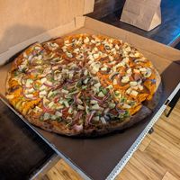 Whole Pizza: Normal tomato sauce, mixed with normal vegan cashew cream cheese, pineapple.
Left/Bottom Half: Red onion, artichoke, green pepper
Right/Top Half: Pepperoni, mushrooms at Pizza Head in St Louis