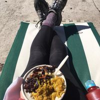 Delicious eggplant moju curry with rice, cabbage, & dal, on a beautiful sunny spring day. at Moab Kitchen in Moab