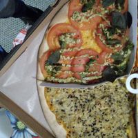 Pesto(not good) and bacon with alho poró (good) at Opte Pizzas in Curitiba