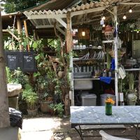 You have to wash your own dishes after you eat and then just leave money in the jars. Seems this place also serves no -veg options (see sign) but the buffet is fully vegan  at 9 Angels Warung in Ubud