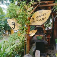 The entrance is tucked away at 9 Angels Warung in Ubud