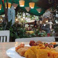 outside in the garden at 9 Angels Warung in Ubud