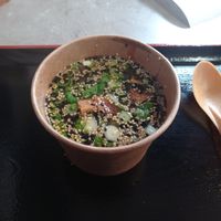 Miso soup with tofu, sesame seeds, green onion at Foodstock  in Bratislava