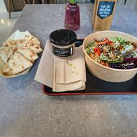 Poke Bowl houmous and hot bread. at Foodstock  in Bratislava
