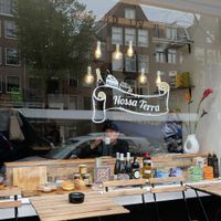 From outside looking into the cafe at Nossa Terra in Amsterdam