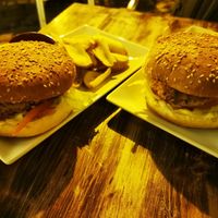 Burgers with fries at Petite Sophie in Mahon