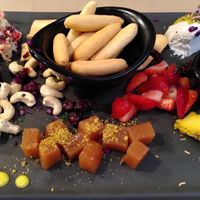 Cheese platter with fruit and crackers at Mapa Verde in San Sebastian
