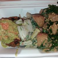 Sweet potato burger with hummus and pesto with a selection of salad at Shoots and Roots in Dublin