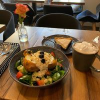 Cheesecake, hot chocolate with cream and a jacket potato. Yummie at Rosenberg in Potsdam