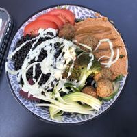 Oriental Bowl for 13€ was too expensive and not very special. Consisted mostly of raw veggies, plain lentils, some falafels and some hummus. But it was not very filling. at Rosenberg in Potsdam