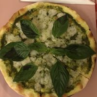 Pizza with pesto sauce and vegan mozarella ( thin crust)  at Rad Rabbit in Chiang Mai