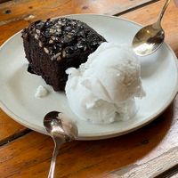 A hot, chocolate brownie 🤤 with coconut ice cream   at Rad Rabbit in Chiang Mai