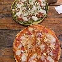 Two farm villa pizza, one with tomato base and one with pesto base  at Rad Rabbit in Chiang Mai