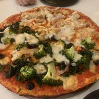 Half and half spicy chicken + garden pizza   at Rad Rabbit in Chiang Mai