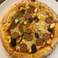 Pizza with vegan sausage at Rad Rabbit in Chiang Mai