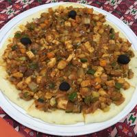 A vegan pizza. at Rabsel Garden Cafe at Shechen Monastery in Kathmandu
