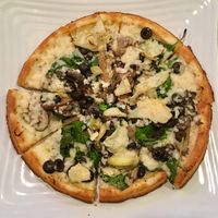 Gluten free pizza with vegan cheese, roasted garlic extra virgin olive oil, and veggies at Ultimate California Pizza in Myrtle Beach